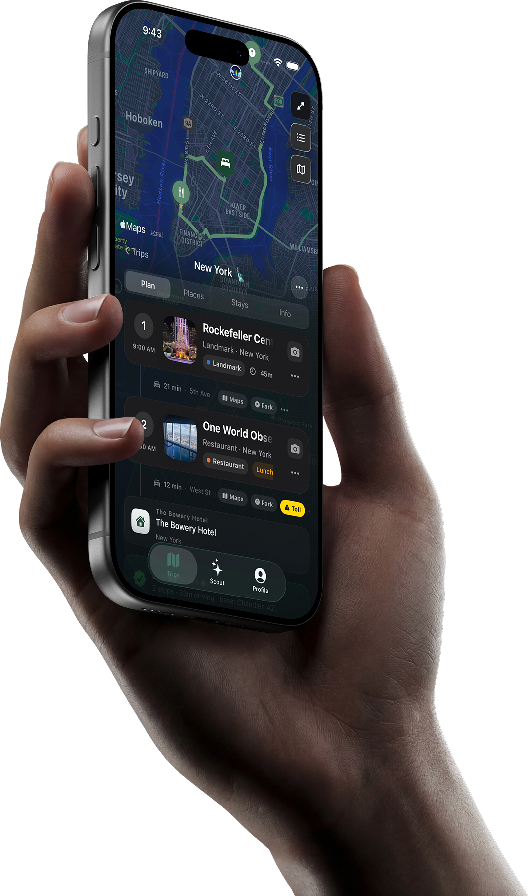 Hand holding an iPhone with Outpost Go smart trip insights and route details